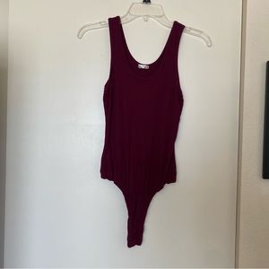 Maroon rubbed body suit